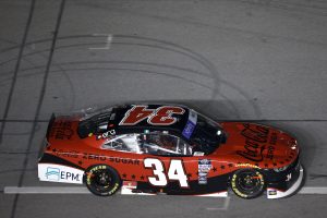 DAYTONA BEACH, FLORIDA - AUGUST 26: Jesse Iwuji, driver of the #34 Coca-Cola Zero Sugar Chevrolet, drives during qualifying for the NASCAR Xfinity Series Wawa 250 powered by Coca-Cola at Daytona International Speedway on August 26, 2022 in Daytona Beach, Florida. (Photo by Meg Oliphant/Getty Images) | Getty Images