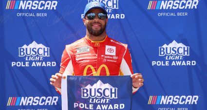 BROOKLYN, MICHIGAN - AUGUST 06: Bubba Wallace, driver of the #23 McDonald's Toyota, ,poses for photos after winning the pole award during qualifying for the NASCAR Cup Series FireKeepers Casino 400 at Michigan International Speedway on August 06, 2022 in Brooklyn, Michigan. (Photo by Mike Mulholland/Getty Images) | Getty Images