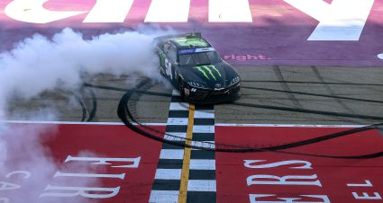 BROOKLYN, MICHIGAN - AUGUST 06: Ty Gibbs, driver of the #54 Monster Energy Toyota, celebrates with a burnout after winning the NASCAR Xfinity Series New Holland 250 at Michigan International Speedway on August 06, 2022 in Brooklyn, Michigan. (Photo by Mike Mulholland/Getty Images) | Getty Images