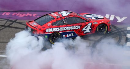 BROOKLYN, MICHIGAN - AUGUST 07: Kevin Harvick, driver of the #4 Busch Light Apple #BuschelOfBusch Ford, celebrates with a burnout after winning the NASCAR Cup Series FireKeepers Casino 400 at Michigan International Speedway on August 07, 2022 in Brooklyn, Michigan. (Photo by Mike Mulholland/Getty Images) | Getty Images