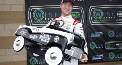 KANSAS CITY, KANSAS - SEPTEMBER 10: Tyler Reddick, driver of the #8 Guaranteed Rate Chevrolet, poses with a toy car after winning the pole award during qualifying for the NASCAR Cup Series Hollywood Casino 400 at Kansas Speedway on September 10, 2022 in Kansas City, Kansas. (Photo by Chris Graythen/Getty Images) | Getty Images