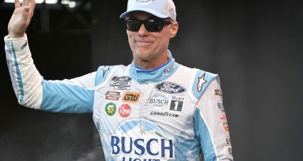 DARLINGTON, SOUTH CAROLINA - SEPTEMBER 04: Kevin Harvick, driver of the #4 Busch Light Retro Ford, waves to fans as he walks onstage during driver intros prior to the NASCAR Cup Series Cook Out Southern 500 at Darlington Raceway on September 04, 2022 in Darlington, South Carolina. (Photo by Logan Riely/Getty Images) | Getty Images