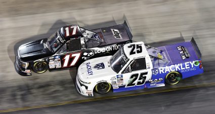 BRISTOL, TENNESSEE - SEPTEMBER 15: Taylor Gray, driver of the #17 Dead On Tools Ford,  and Matt DiBenedetto, driver of the #25 Rackley Roofing/WAR Shocks Chevrolet, race during the NASCAR Camping World Truck Series UNOH 200 at Bristol Motor Speedway on September 15, 2022 in Bristol, Tennessee. (Photo by Sean Gardner/Getty Images) | Getty Images