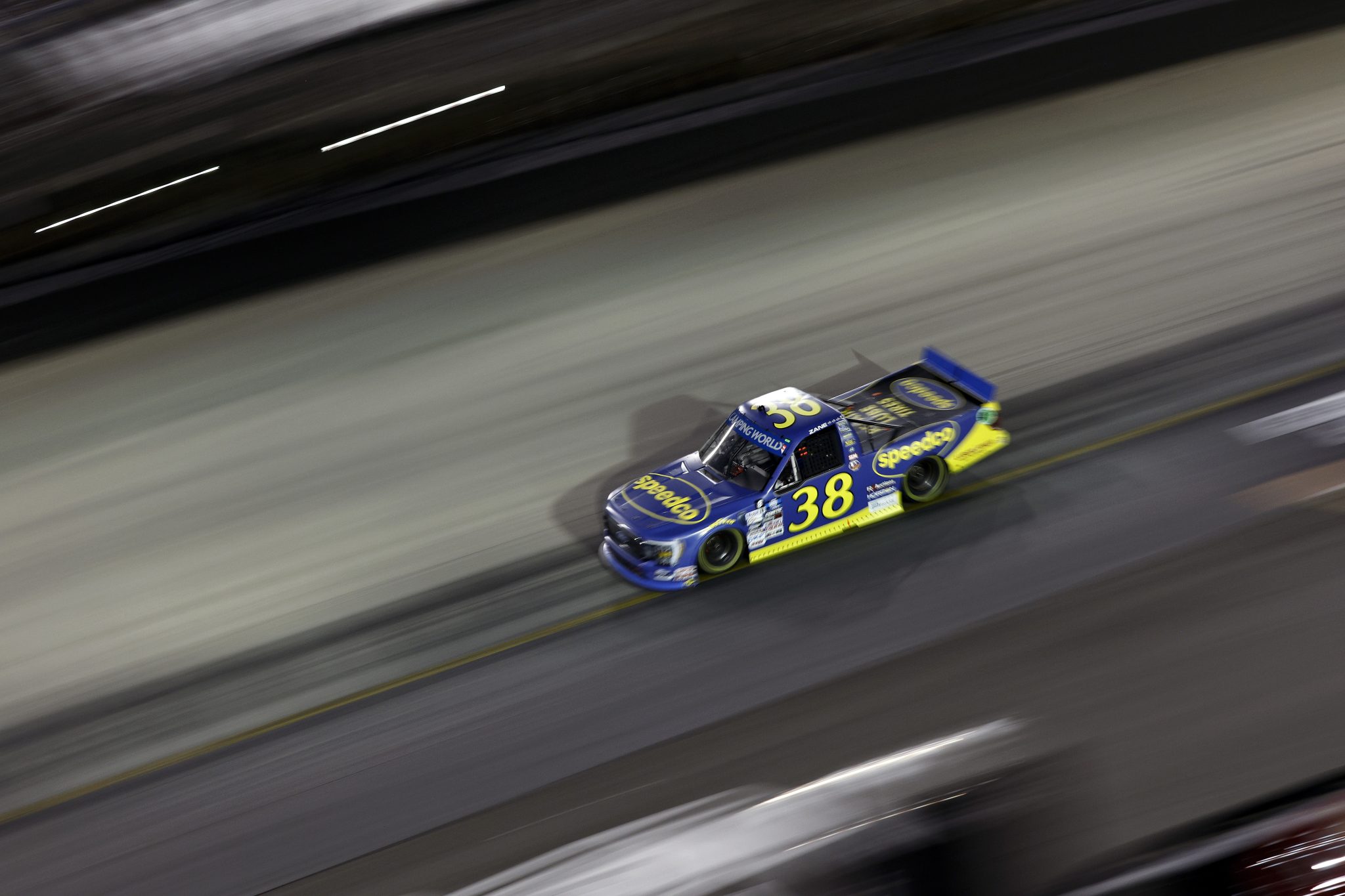 BRISTOL, TENNESSEE - SEPTEMBER 15: Zane Smith, driver of the #38 Speedco/Luber Finer Toyota, drives during the NASCAR Camping World Truck Series UNOH 200 at Bristol Motor Speedway on September 15, 2022 in Bristol, Tennessee. (Photo by Sean Gardner/Getty Images) | Getty Images