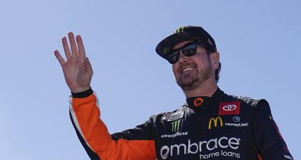 RICHMOND, VIRGINIA - APRIL 03: Kurt Busch, driver of the #45 Embrace Home Loans Toyota, waves to fans onstage during driver intros prior to the NASCAR Cup Series Toyota Owners 400 at Richmond Raceway on April 03, 2022 in Richmond, Virginia. (Photo by Jacob Kupferman/Getty Images) | Getty Images