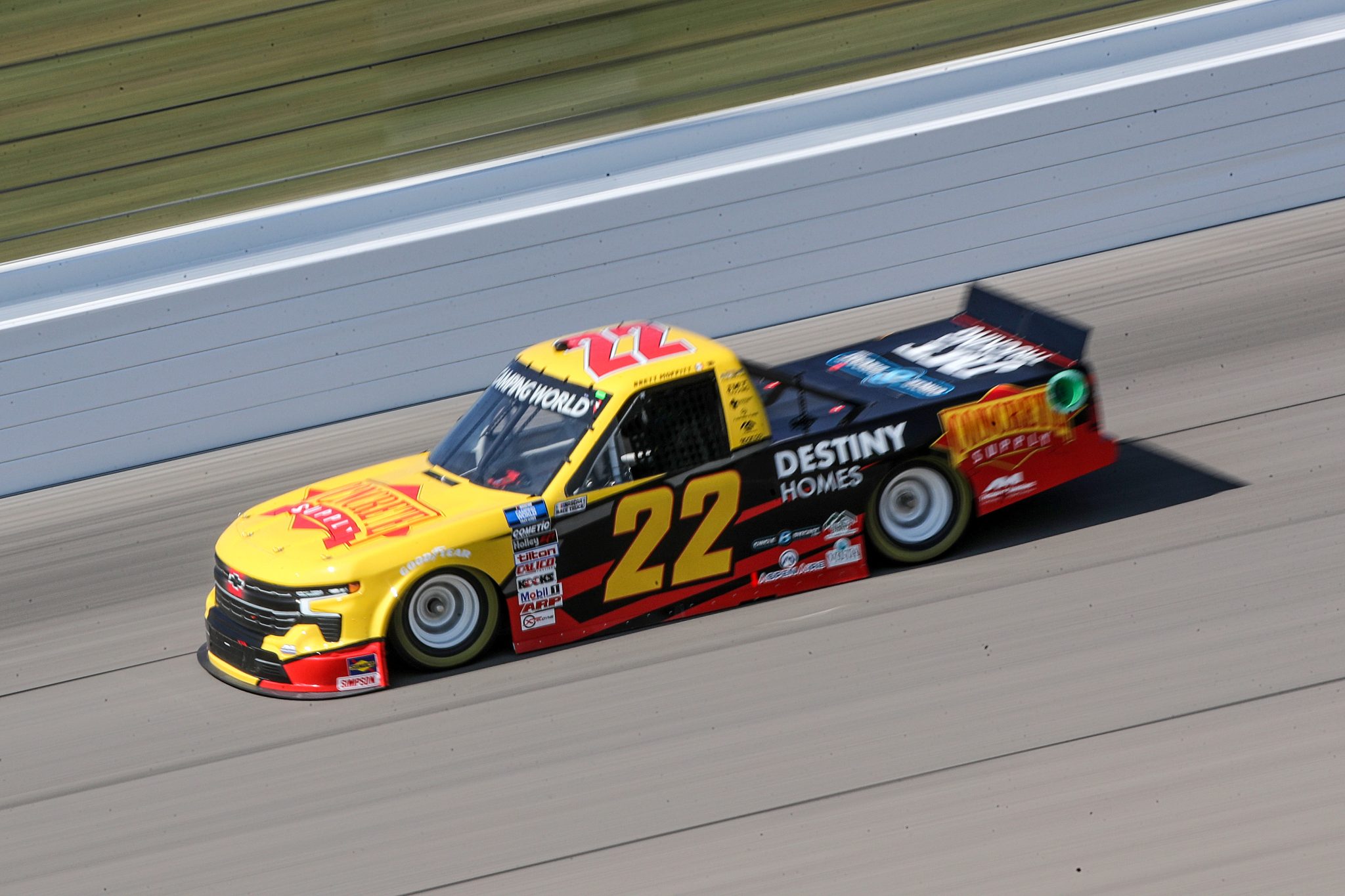 KANSAS CITY, KANSAS - SEPTEMBER 09: Brett Moffitt, driver of the #22 Concrete Supply/Destiny Homes Chevrolet, drives during qualifying for the NASCAR Camping World Truck Series Kansas Lottery 200 at Kansas Speedway on September 09, 2022 in Kansas City, Kansas. (Photo by Meg Oliphant/Getty Images) | Getty Images