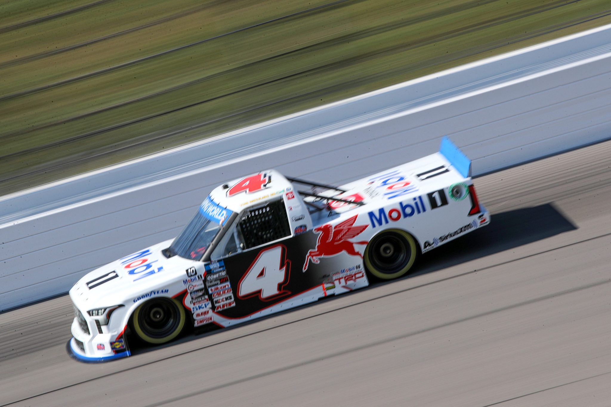 KANSAS CITY, KANSAS - SEPTEMBER 09: John Hunter Nemechek, driver of the #4 Mobil 1 Toyota, drives during qualifying for the NASCAR Camping World Truck Series Kansas Lottery 200 at Kansas Speedway on September 09, 2022 in Kansas City, Kansas. (Photo by Meg Oliphant/Getty Images) | Getty Images