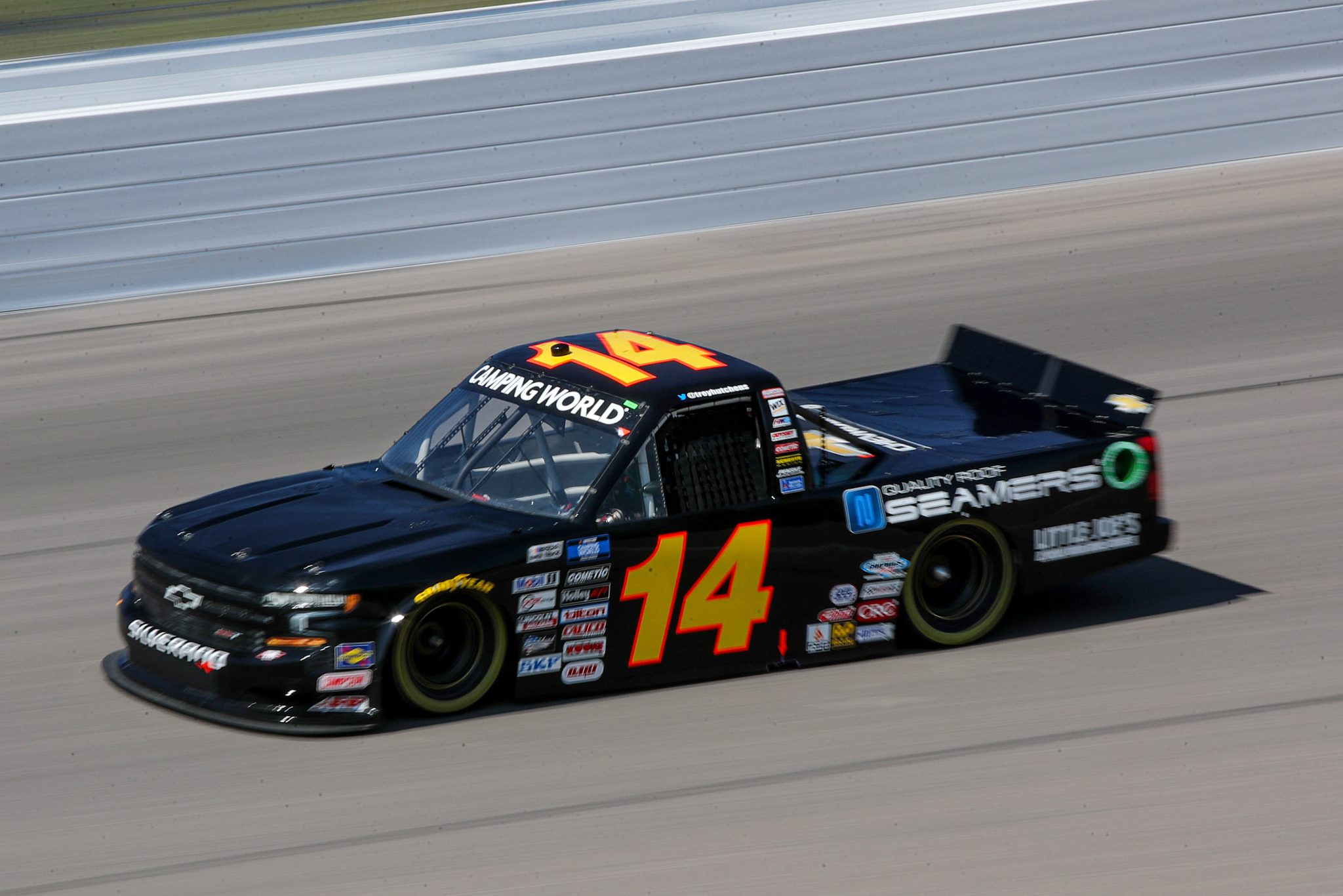 KANSAS CITY, KANSAS - SEPTEMBER 09: Trey Hutchens, driver of the #14 Quality Roof Seamers Chevrolet, drives during qualifying for the NASCAR Camping World Truck Series Kansas Lottery 200 at Kansas Speedway on September 09, 2022 in Kansas City, Kansas. (Photo by Meg Oliphant/Getty Images) | Getty Images