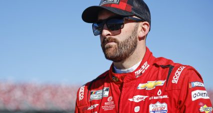 TALLADEGA, ALABAMA - OCTOBER 01: Austin Dillon, driver of the #3 Bass Pro Shops /TRACKER Off Road Chevrolet, walks the grid during qualifying for the NASCAR Cup Series YellaWood 500 at Talladega Superspeedway on October 01, 2022 in Talladega, Alabama. (Photo by Sean Gardner/Getty Images) | Getty Images