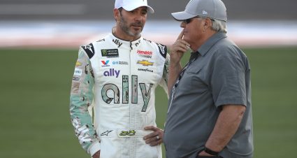 CHARLOTTE, NORTH CAROLINA - MAY 23: (L-R) Jimmie Johnson, driver of the #48 Ally Patriotic Chevrolet, and NASCAR Hall of Famer and team owner Rick Hendrick talk during qualifying for the Monster Energy NASCAR Cup Series Race Coca-Cola 600 at Charlotte Motor Speedway on May 23, 2019 in Charlotte, North Carolina.  (Photo by Streeter Lecka/Getty Images) | Getty Images
