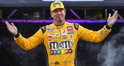 BRISTOL, TENNESSEE - SEPTEMBER 17: Kyle Busch, driver of the #18 M&M's Toyota, walks onstage during driver intros prior to the NASCAR Cup Series Bass Pro Shops Night Race at Bristol Motor Speedway on September 17, 2022 in Bristol, Tennessee. (Photo by Logan Riely/Getty Images) | Getty Images