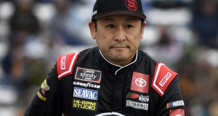 MARTINSVILLE, VIRGINIA - OCTOBER 30: Akinori Ogata, driver of the #78 Pneumatic Tools Toyota, walks on stage during pre-race ceremonies prior to the NASCAR Xfinity Series Dead on Tools 250 at Martinsville Speedway on October 30, 2021 in Martinsville, Virginia. (Photo by Logan Riely/Getty Images) | Getty Images
