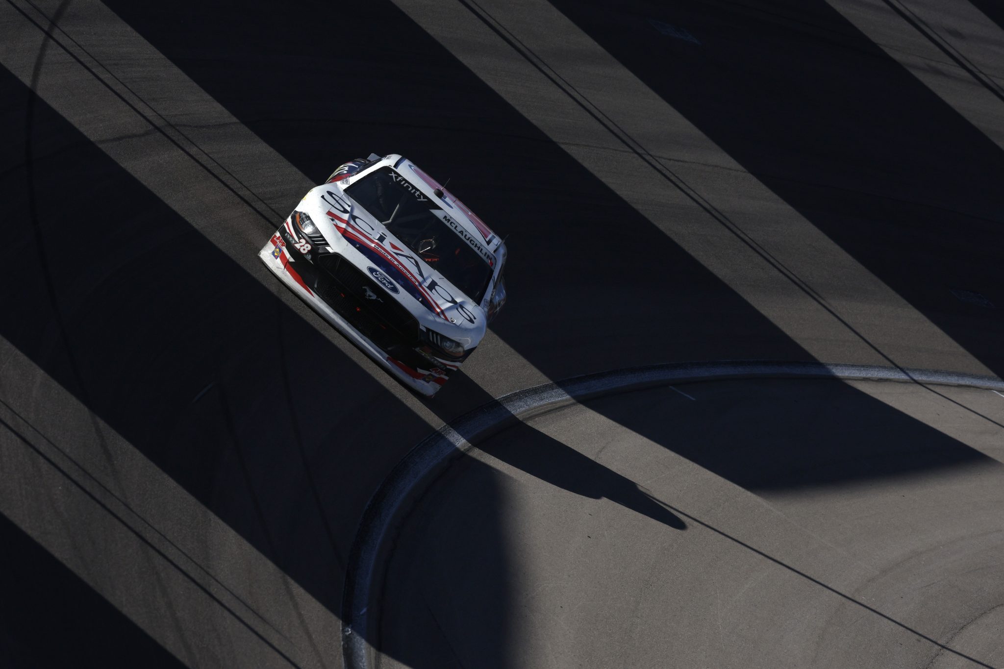 LAS VEGAS, NEVADA - OCTOBER 14: CJ McLaughlin, driver of the #28 Sci Aps Ford, drives during the NASCAR Xfinity Series Alsco Uniforms 302 at Las Vegas Motor Speedway on October 14, 2023 in Las Vegas, Nevada. (Photo by Sean Gardner/Getty Images) | Getty Images