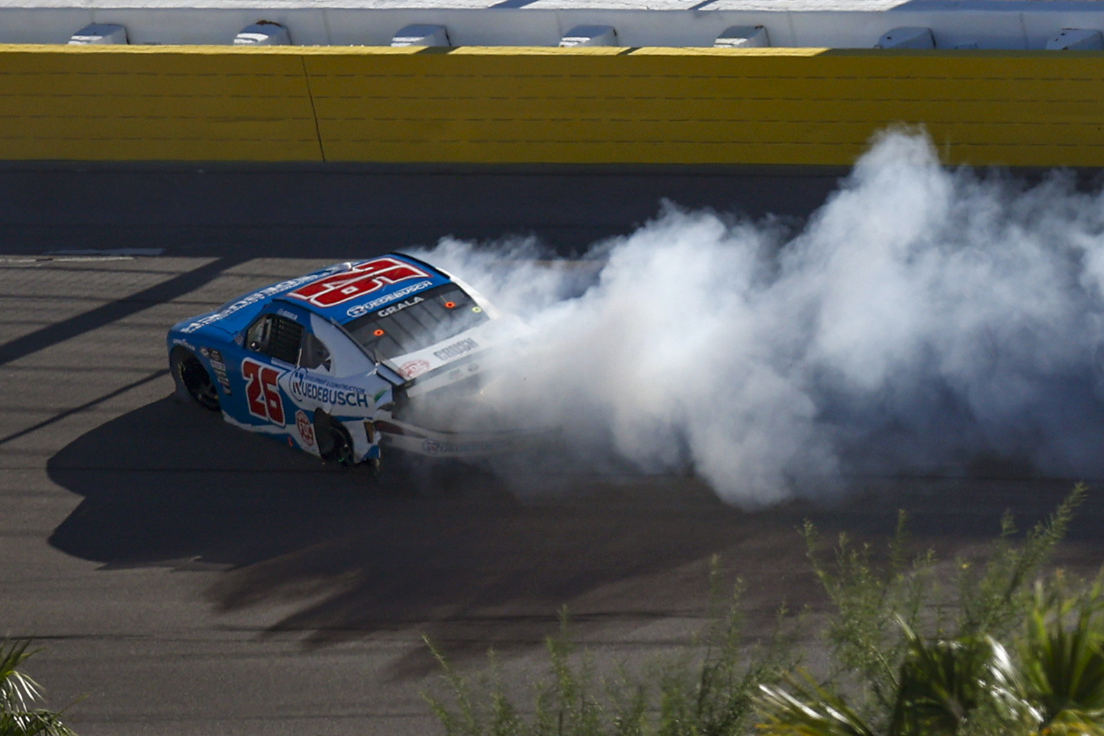 LAS VEGAS, NEVADA - OCTOBER 14: Kaz Grala, driver of the #26 Ruedebusch Toyota, spins after an on-track incident during the NASCAR Xfinity Series Alsco Uniforms 302 at Las Vegas Motor Speedway on October 14, 2023 in Las Vegas, Nevada. (Photo by Sean Gardner/Getty Images) | Getty Images