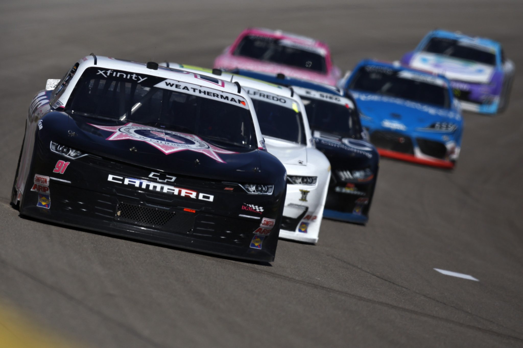 LAS VEGAS, NEVADA - OCTOBER 14: Kyle Weatherman, driver of the #91 PORAC Chevrolet, drives during the NASCAR Xfinity Series Alsco Uniforms 302 at Las Vegas Motor Speedway on October 14, 2023 in Las Vegas, Nevada. (Photo by Sean Gardner/Getty Images) | Getty Images