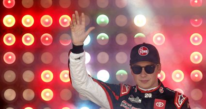 LAS VEGAS, NEVADA - OCTOBER 15: Christopher Bell, driver of the #20 Rheem/Smurfit Kappa Toyota, waves to fans as he walks onstage during driver intros prior to the NASCAR Cup Series South Point 400 at Las Vegas Motor Speedway on October 15, 2023 in Las Vegas, Nevada. (Photo by Sean Gardner/Getty Images) | Getty Images