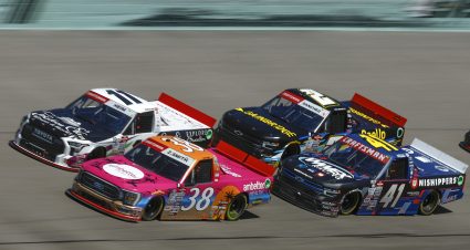 HOMESTEAD, FLORIDA - OCTOBER 21: Zane Smith, driver of the #38 Ambetter Health Ford, Corey Heim, driver of the #11 Chateau Elan/Explore Braselton Toyota, Bayley Currey, driver of the #41 Unishippers Chevrolet, and Nick Sanchez, driver of the #2 Gainbridge Chevrolet, race during the NASCAR Craftsman Truck Series Baptist Health Cancer Care 200 at Homestead-Miami Speedway on October 21, 2023 in Homestead, Florida. (Photo by Sean Gardner/Getty Images) | Getty Images