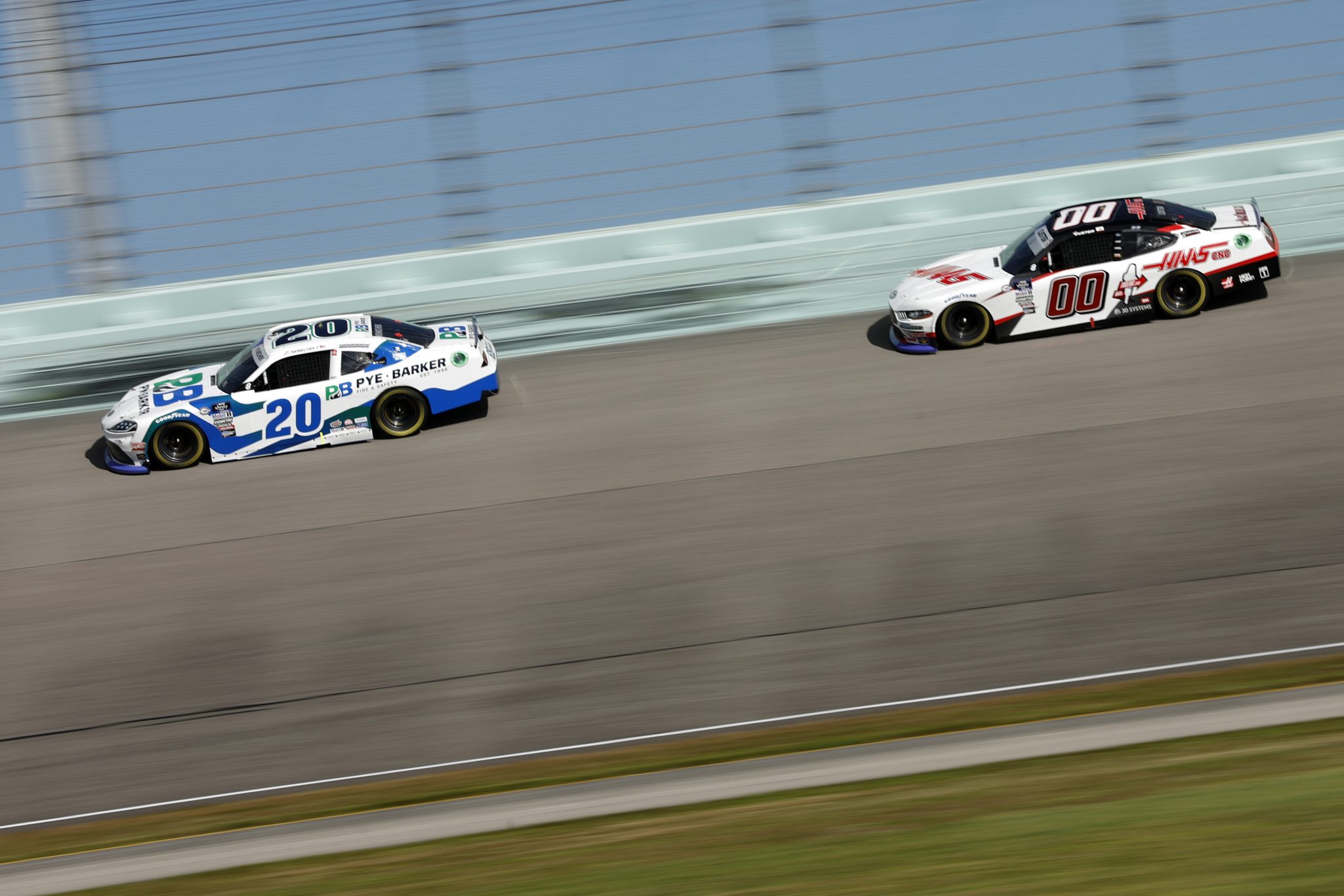 HOMESTEAD, FLORIDA - OCTOBER 21: John Hunter Nemechek, driver of the #20 Pye Barker Fire & Safety Toyota, and Cole Custer, driver of the #00 Haas Automation Ford, race during the NASCAR Xfinity Series Contender Boats 300 at Homestead-Miami Speedway on October 21, 2023 in Homestead, Florida. (Photo by Sean Gardner/Getty Images) | Getty Images
