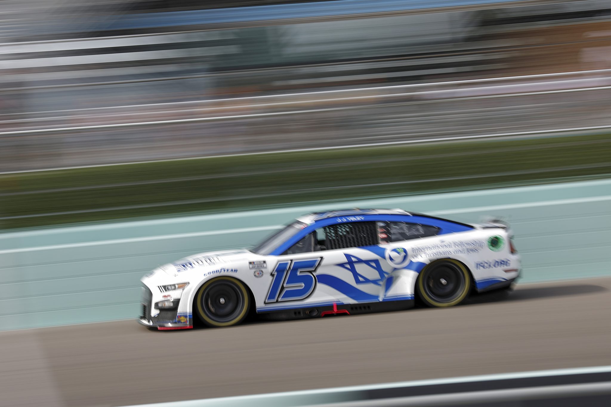 HOMESTEAD, FLORIDA - OCTOBER 22: JJ Yeley, driver of the #15 IFCJ.org Ford, drives during the NASCAR Cup Series 4EVER 400 Presented by Mobil 1 at Homestead-Miami Speedway on October 22, 2023 in Homestead, Florida. (Photo by James Gilbert/Getty Images) | Getty Images