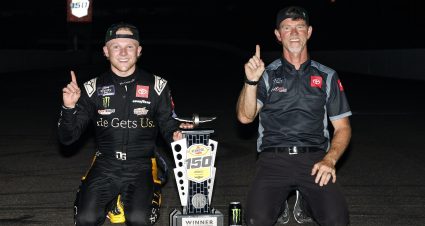 INDIANAPOLIS, INDIANA - AUGUST 12: Ty Gibbs, driver of the #19 He Gets Us Toyota, and crew chief Jason Ratcliff celebrates at the bricks after winning the NASCAR Xfinity Series Pennzoil 150 at the Brickyard at Indianapolis Motor Speedway on August 12, 2023 in Indianapolis, Indiana. (Photo by Sean Gardner/Getty Images) | Getty Images