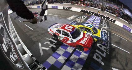 MARTINSVILLE, VIRGINIA - OCTOBER 28: Justin Allgaier, driver of the #7 Hellmann's Chevrolet, takes the checkered flag over Sheldon Creed, driver of the #2 Whelen Chevrolet, to win the NASCAR Xfinity Series Dead On Tools 250 at Martinsville Speedway on October 28, 2023 in Martinsville, Virginia. (Photo by Jonathan Bachman/Getty Images) | Getty Images
