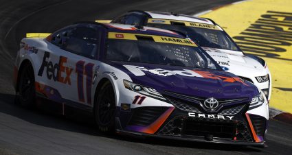 MARTINSVILLE, VIRGINIA - OCTOBER 29: Denny Hamlin, driver of the #11 FedEx Toyota, and Ryan Blaney, driver of the #12 Discount Tire Ford, race during the NASCAR Cup Series Xfinity 500 at Martinsville Speedway on October 29, 2023 in Martinsville, Virginia. (Photo by Chris Graythen/Getty Images) | Getty Images