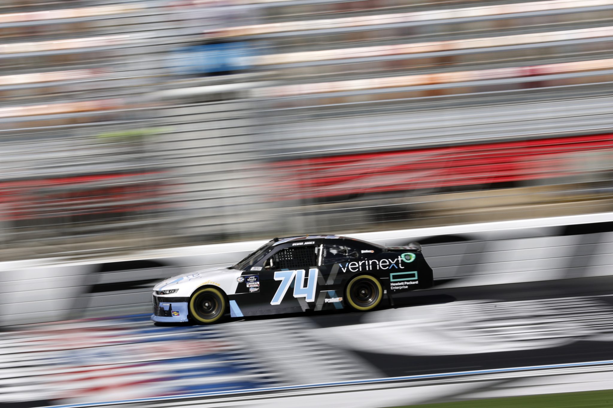 CONCORD, NORTH CAROLINA - OCTOBER 07: Devin Jones, driver of the #74 Verinext/HPE Chevrolet, drives during qualifying for the NASCAR Xfinity Series Drive for the Cure 250 presented by BCBS at Charlotte Motor Speedway on October 07, 2023 in Concord, North Carolina. (Photo by James Gilbert/Getty Images) | Getty Images