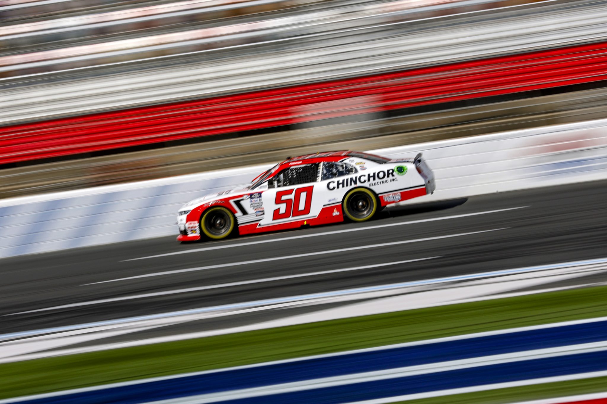 CONCORD, NORTH CAROLINA - OCTOBER 07: Preston Pardus, driver of the #50 Chinchor Electric Inc. Chevrolet, drives during qualifying for the NASCAR Xfinity Series Drive for the Cure 250 presented by BCBS at Charlotte Motor Speedway on October 07, 2023 in Concord, North Carolina. (Photo by James Gilbert/Getty Images) | Getty Images