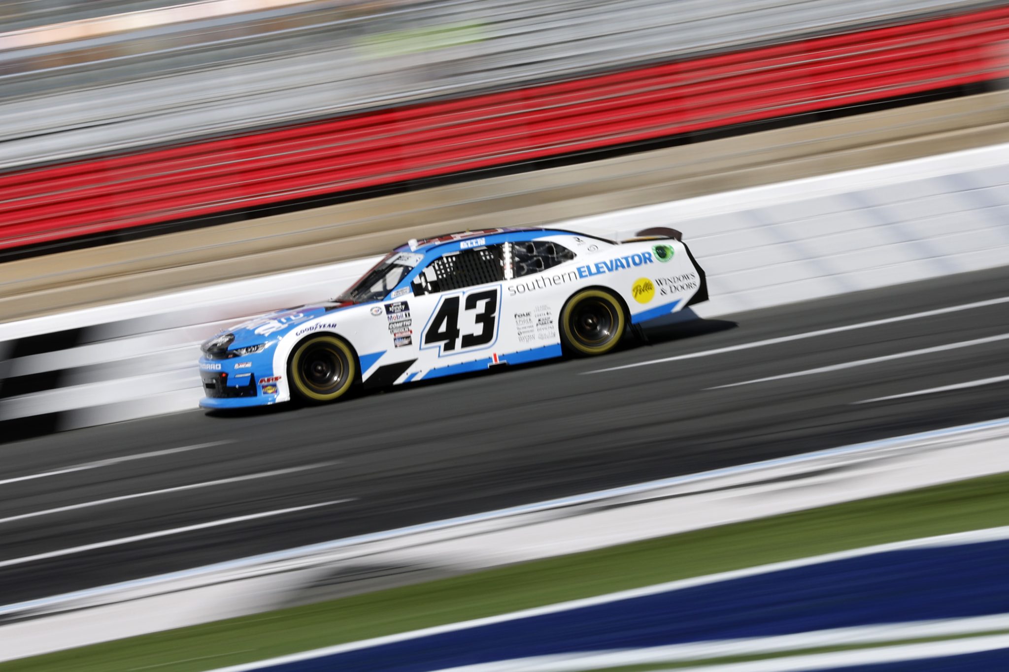 CONCORD, NORTH CAROLINA - OCTOBER 07: Ryan Ellis, driver of the #43 Southern Elevator Chevrolet, drives during qualifying for the NASCAR Xfinity Series Drive for the Cure 250 presented by BCBS at Charlotte Motor Speedway on October 07, 2023 in Concord, North Carolina. (Photo by James Gilbert/Getty Images) | Getty Images