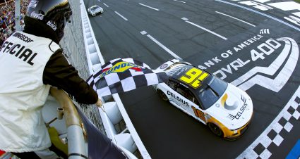 CONCORD, NORTH CAROLINA - OCTOBER 08: AJ Allmendinger, driver of the #16 Celsius Chevrolet, takes the checkered flag to win the NASCAR Cup Series Bank of America ROVAL 400 at Charlotte Motor Speedway on October 08, 2023 in Concord, North Carolina. (Photo by James Gilbert/Getty Images) | Getty Images