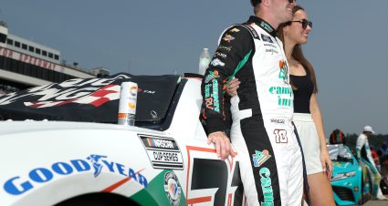 LOUDON, NEW HAMPSHIRE - JULY 17: Justin Haley, driver of the #31 Campers Inn RV Chevrolet, and Haley Mottinger pose for photos on the grid prior to the NASCAR Cup Series Crayon 301 at New Hampshire Motor Speedway on July 17, 2023 in Loudon, New Hampshire. (Photo by Meg Oliphant/Getty Images) | Getty Images