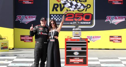 TALLADEGA, ALABAMA - SEPTEMBER 30: Brett Moffitt, driver of the #34 Fr8Auctions Ford, celebrates with Stephanie Campo in victory lane after winning  the NASCAR Craftsman Truck Series Love's RV Stop 250 at Talladega Superspeedway on September 30, 2023 in Talladega, Alabama. (Photo by Meg Oliphant/Getty Images) | Getty Images