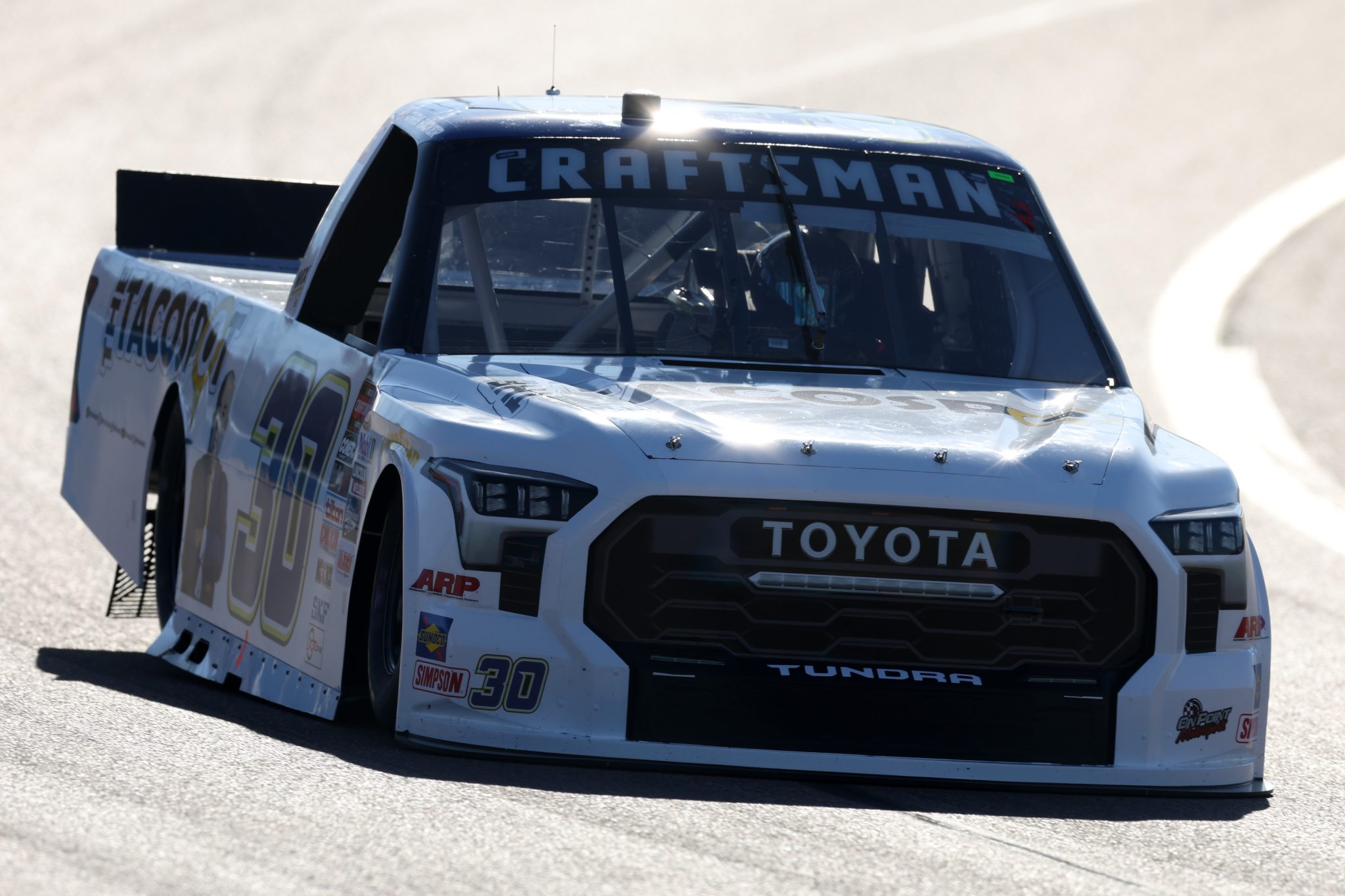 AVONDALE, ARIZONA - NOVEMBER 03: Chris Hacker, driver of the #30 On Point Motorsports Toyota, drives during qualifying for the NASCAR Craftsman Truck Series Craftsman 150 at Phoenix Raceway on November 03, 2023 in Avondale, Arizona. (Photo by Christian Petersen/Getty Images) | Getty Images