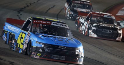 AVONDALE, ARIZONA - NOVEMBER 03: Carson Hocevar, driver of the #42 Worldwide Express Chevrolet, and Corey Heim, driver of the #11 Safelite Toyota, race during the NASCAR Craftsman Truck Series Craftsman 150 at Phoenix Raceway on November 03, 2023 in Avondale, Arizona. (Photo by Sean Gardner/Getty Images) | Getty Images
