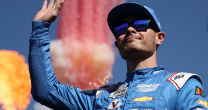 AVONDALE, ARIZONA - NOVEMBER 05: Kyle Larson, driver of the #5 HendrickCars.com Chevrolet, waves to fans onstage during driver intros prior to the NASCAR Cup Series Championship at Phoenix Raceway on November 05, 2023 in Avondale, Arizona. (Photo by Jared C. Tilton/Getty Images) | Getty Images