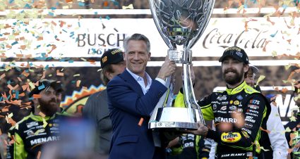 AVONDALE, ARIZONA - NOVEMBER 05: NASCAR President Steve Phelps  presents the Bill France NASCAR Cup Series Championship trophy to Ryan Blaney, driver of the #12 Menards/Dutch Boy Ford, in victory lane after winning the 2023 NASCAR Cup Series Championship, finishing first of the Championship 4 drivers in the NASCAR Cup Series Championship race at Phoenix Raceway on November 05, 2023 in Avondale, Arizona. (Photo by Sean Gardner/Getty Images) | Getty Images