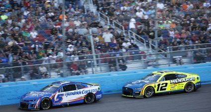 AVONDALE, ARIZONA - NOVEMBER 05: Kyle Larson, driver of the #5 HendrickCars.com Chevrolet, and Ryan Blaney, driver of the #12 Menards/Dutch Boy Ford, race during the NASCAR Cup Series Championship at Phoenix Raceway on November 05, 2023 in Avondale, Arizona. (Photo by Chris Graythen/Getty Images) | Getty Images