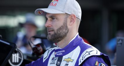 INDIANAPOLIS, INDIANA - AUGUST 12: Shane Van Gisbergen, driver of the #91 Enhance Health Chevrolet, looks on in the garage area during practice for the NASCAR Cup Series Verizon 200 at the Brickyard at Indianapolis Motor Speedway on August 12, 2023 in Indianapolis, Indiana. (Photo by Justin Casterline/Getty Images) | Getty Images
