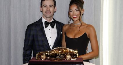 NASHVILLE, TENNESSEE - NOVEMBER 30: 2023 NASCAR Cup Series Champion, Ryan Blaney and Gianna Tulio pose for photos with the Goodyear Gold Car during a reception prior to the NASCAR Awards and Champion Celebration at the Music City Center on November 30, 2023 in Nashville, Tennessee. (Photo by Chris Graythen/Getty Images) | Getty Images