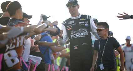 DARLINGTON, SOUTH CAROLINA - SEPTEMBER 03: Kyle Busch, driver of the #8 McLaren Custom Grills Chevrolet, greets fans with his son, Brexton Busch during pre-race ceremonies prior to the NASCAR Cup Series Cook Out Southern 500 at Darlington Raceway on September 03, 2023 in Darlington, South Carolina. (Photo by James Gilbert/Getty Images) | Getty Images