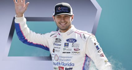 HOMESTEAD, FLORIDA - OCTOBER 23: Todd Gilliland, driver of the #38 EO South Florida Ford, waves to fans as he walks onstage during driver intros prior to the NASCAR Cup Series Dixie Vodka 400 at Homestead-Miami Speedway on October 23, 2022 in Homestead, Florida. (Photo by Sean Gardner/Getty Images) | Getty Images