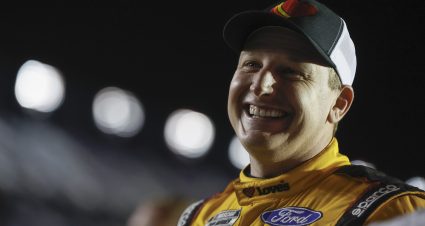 DAYTONA BEACH, FLORIDA - FEBRUARY 15: Michael McDowell, driver of the #34 Love's Travel Stops Ford, laughs during qualifying for the Busch Light Pole at Daytona International Speedway on February 15, 2023 in Daytona Beach, Florida. (Photo by Sean Gardner/Getty Images) | Getty Images