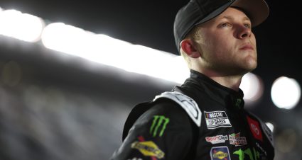 DAYTONA BEACH, FLORIDA - FEBRUARY 15: Ty Gibbs, driver of the #54 Monster Energy/Interstate Batteries Toyota, looks on during qualifying for the Busch Light Pole at Daytona International Speedway on February 15, 2023 in Daytona Beach, Florida. (Photo by James Gilbert/Getty Images) | Getty Images