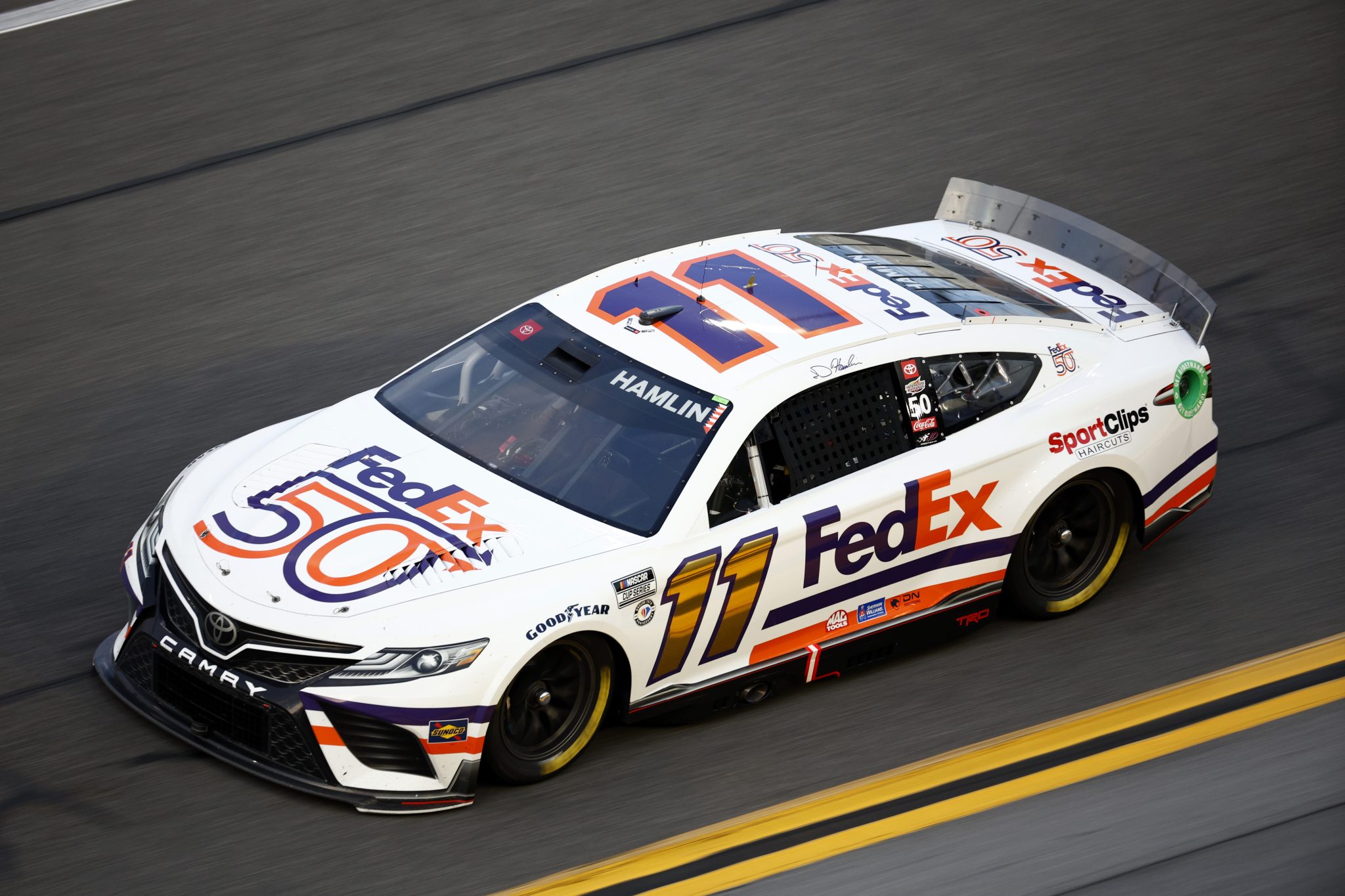 DAYTONA BEACH, FLORIDA - FEBRUARY 17: Denny Hamlin, driver of the #11 FedEx 50 Toyota, drives during practice for the NASCAR Cup Series 65th Annual Daytona 500 at Daytona International Speedway on February 17, 2023 in Daytona Beach, Florida. (Photo by Jared C. Tilton/Getty Images) | Getty Images