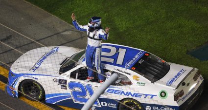 DAYTONA BEACH, FLORIDA - FEBRUARY 18: Austin Hill, driver of the #21 Bennett Transportation Chevrolet, celebrates after winning the NASCAR Xfinity Series Beef. It's What's For Dinner. 300 at Daytona International Speedway on February 18, 2023 in Daytona Beach, Florida. (Photo by Mike Ehrmann/Getty Images) | Getty Images