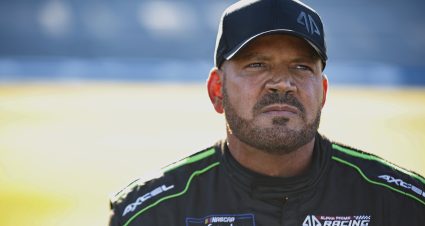 TALLADEGA, ALABAMA - SEPTEMBER 30: Caesar Bacarella, driver of the #45 Clear Cryptos Chevrolet, looks on during qualifying for the NASCAR Xfinity Series Sparks 300 at Talladega Superspeedway on September 30, 2022 in Talladega, Alabama. (Photo by Sean Gardner/Getty Images) | Getty Images