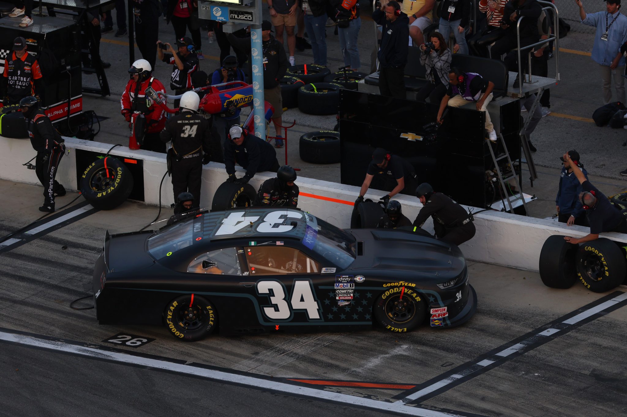 DAYTONA BEACH, FLORIDA - FEBRUARY 18: Jesse Iwuji, driver of the #34 Chevrolet, pits during the NASCAR Xfinity Series Beef. It's What's For Dinner. 300 at Daytona International Speedway on February 18, 2023 in Daytona Beach, Florida. (Photo by Mike Ehrmann/Getty Images) | Getty Images