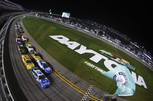 DAYTONA BEACH, FLORIDA - FEBRUARY 19: Ricky Stenhouse Jr., driver of the #47 Kroger/Cottonelle Chevrolet, and Joey Logano, driver of the #22 Shell Pennzoil Ford, race to the checkered flag under caution at the NASCAR Cup Series 65th Annual Daytona 500 at Daytona International Speedway on February 19, 2023 in Daytona Beach, Florida. (Photo by Sean Gardner/Getty Images) | Getty Images
