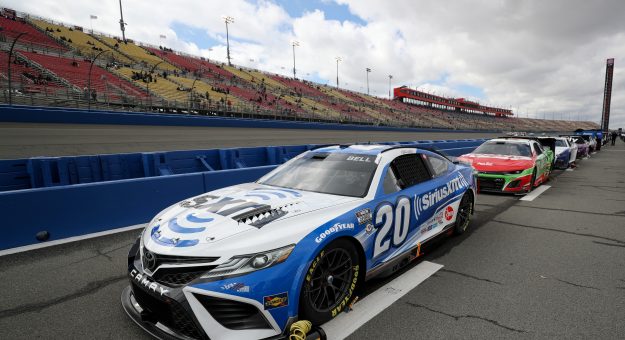 FONTANA, CALIFORNIA - FEBRUARY 26: The #20 Sirius XM Toyota, driven by Christopher Bell sits parked on the grid prior to the NASCAR Cup Series Pala Casino 400 at Auto Club Speedway on February 26, 2023 in Fontana, California. (Photo by Meg Oliphant/Getty Images) | Getty Images