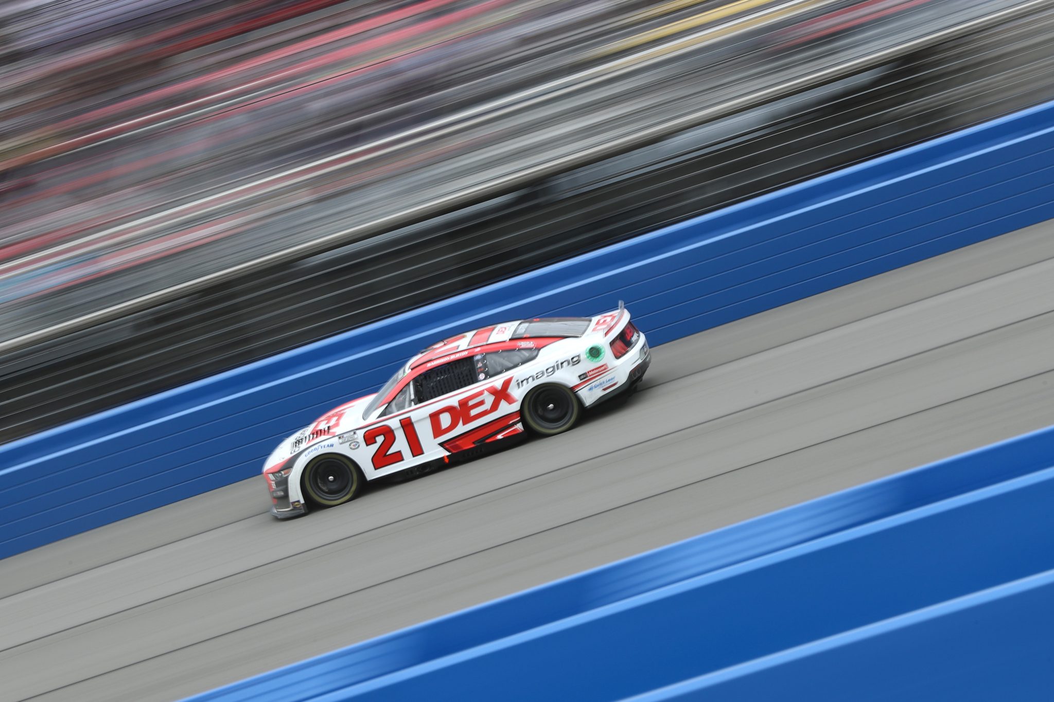 FONTANA, CALIFORNIA - FEBRUARY 26: Harrison Burton, driver of the #21 DEX Imaging Ford, drives during the NASCAR Cup Series Pala Casino 400 at Auto Club Speedway on February 26, 2023 in Fontana, California. (Photo by Meg Oliphant/Getty Images) | Getty Images